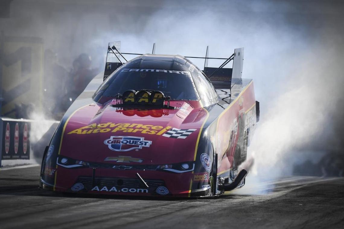 In this photo provided by the NHRA, Courtney Force drives in Friday’s Funny Car qualifying qualifying for the NHRA Four-Wide Nationals drag races at zMAX Dragway in Concord.