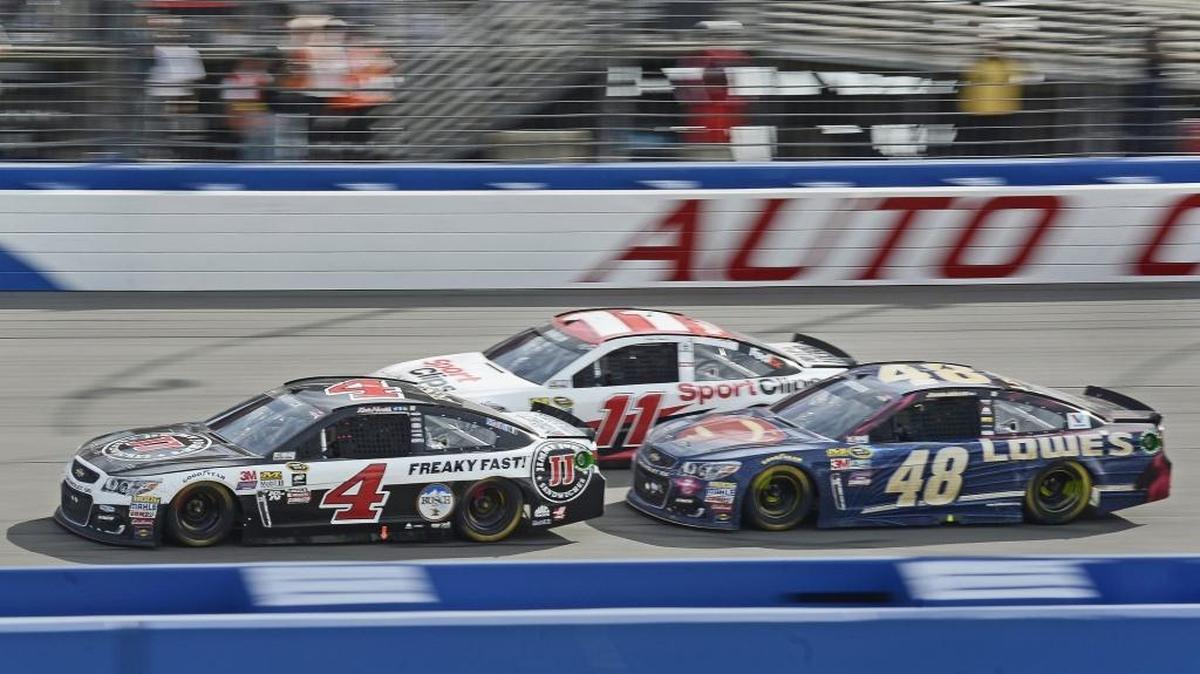 NASCAR’s Steve O’Donnell says the new aerodynamic package has produced closer racing, like at Fontana, Calif., between Kevin Harvick (4), Denny Hamlin (11) and winner Jimmie Johnson (48).