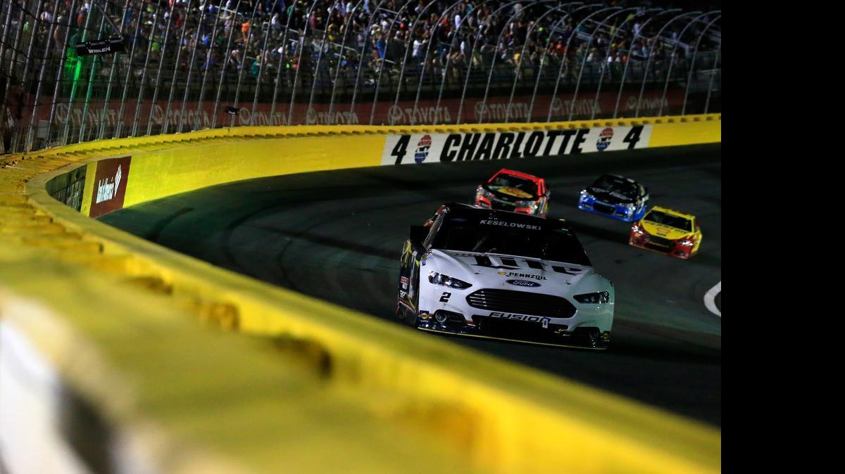 
Brad Keselowski leads a pack of cars during Saturday’s NASCAR Sprint All-Star Race at Charlotte Motor Speedway.


