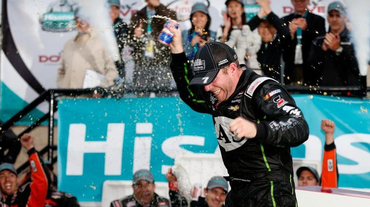 
Regan Smith celebrates in Victory Lane after winning Saturday’s NASCAR XFINITY Series Hisense 200 at Dover International Speedway.


