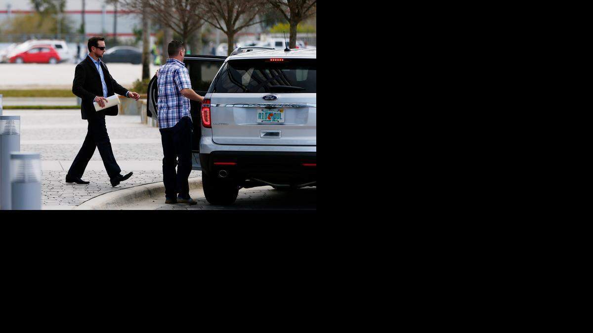 
NASCAR driver Kurt Busch leaves the IMC building after a suspension appeal hearing on Saturday, Feb. 21, 2015 in Daytona Beach, Fla. 
