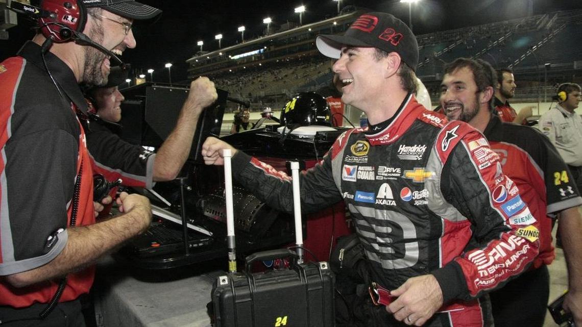 Jeff Gordon (right) won the pole for the EcoBoost 400 at Homestead-Miami Speedway in 2014.