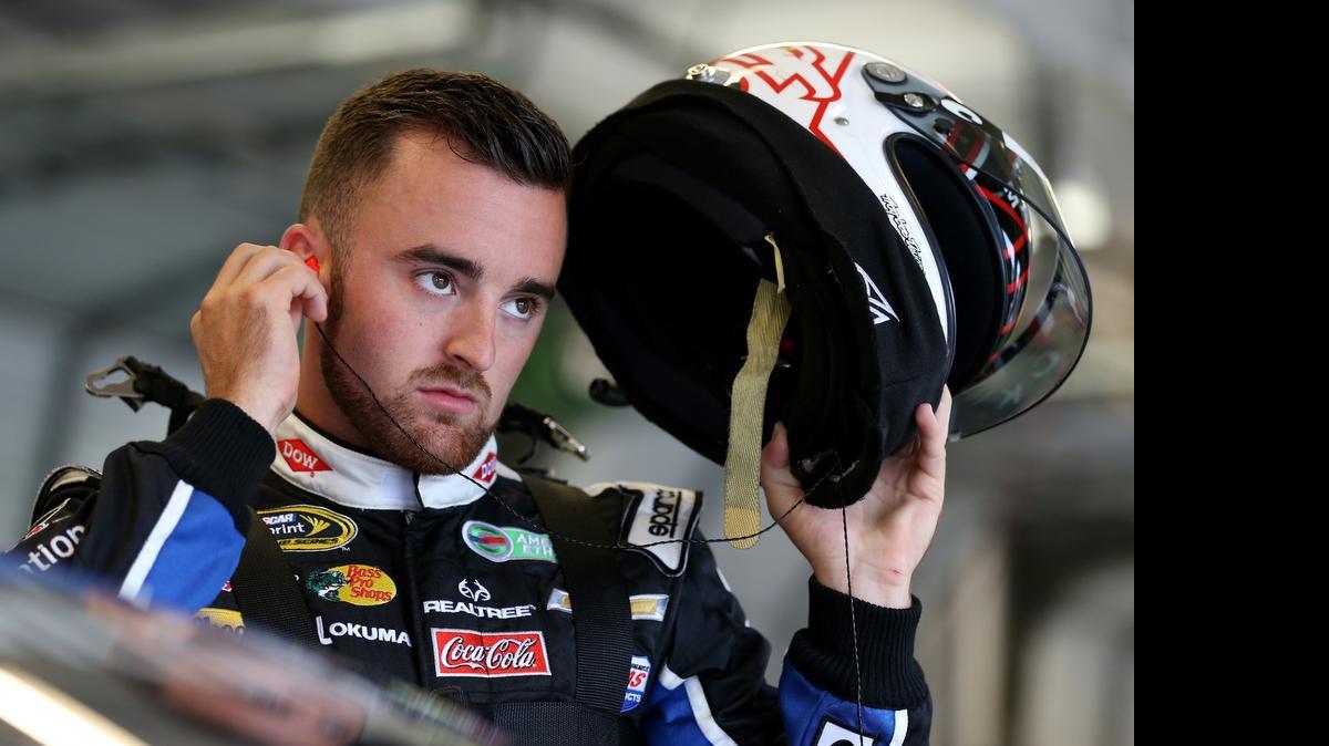 
Austin Dillon prepares his helmet in the garage area during practice for the NASCAR Sprint Cup Series Quaker State 400 Presented by Advance Auto Parts at Kentucky Speedway on July 10, 2015 in Sparta, Ky.
