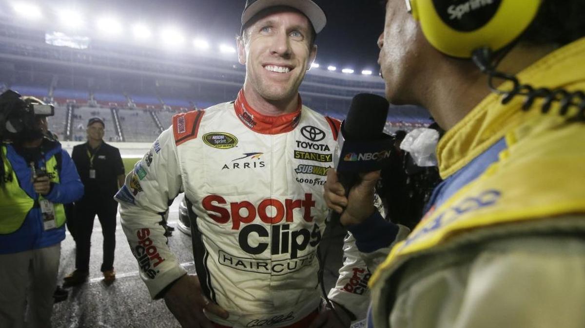 Carl Edwards smiles after winning the Texas AAA 500 Sunday night at Texas Motor Speedway.