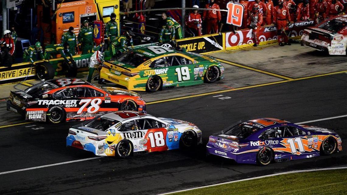 Kyle Busch (18) was in the thick of the chase all night at Sunday’s Coca-Cola 600, but in the end he finished second – and was none too happy.