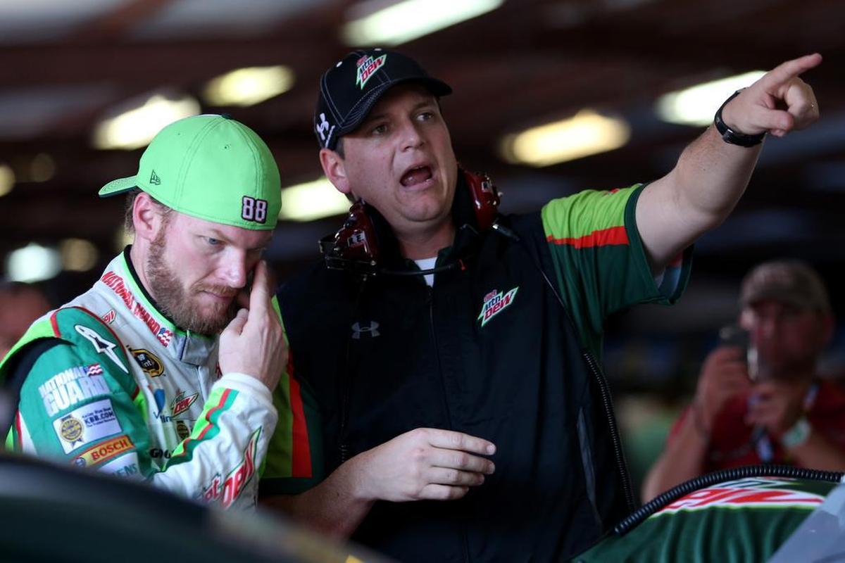 Dale Earnhardt Jr., left, talks to his crew chief, Steve Letarte, in the garage area during practice for the NASCAR Sprint Cup Series GEICO 500 at Talladega Superspeedway on Oct. 17, 2014 in Talladega, Ala.