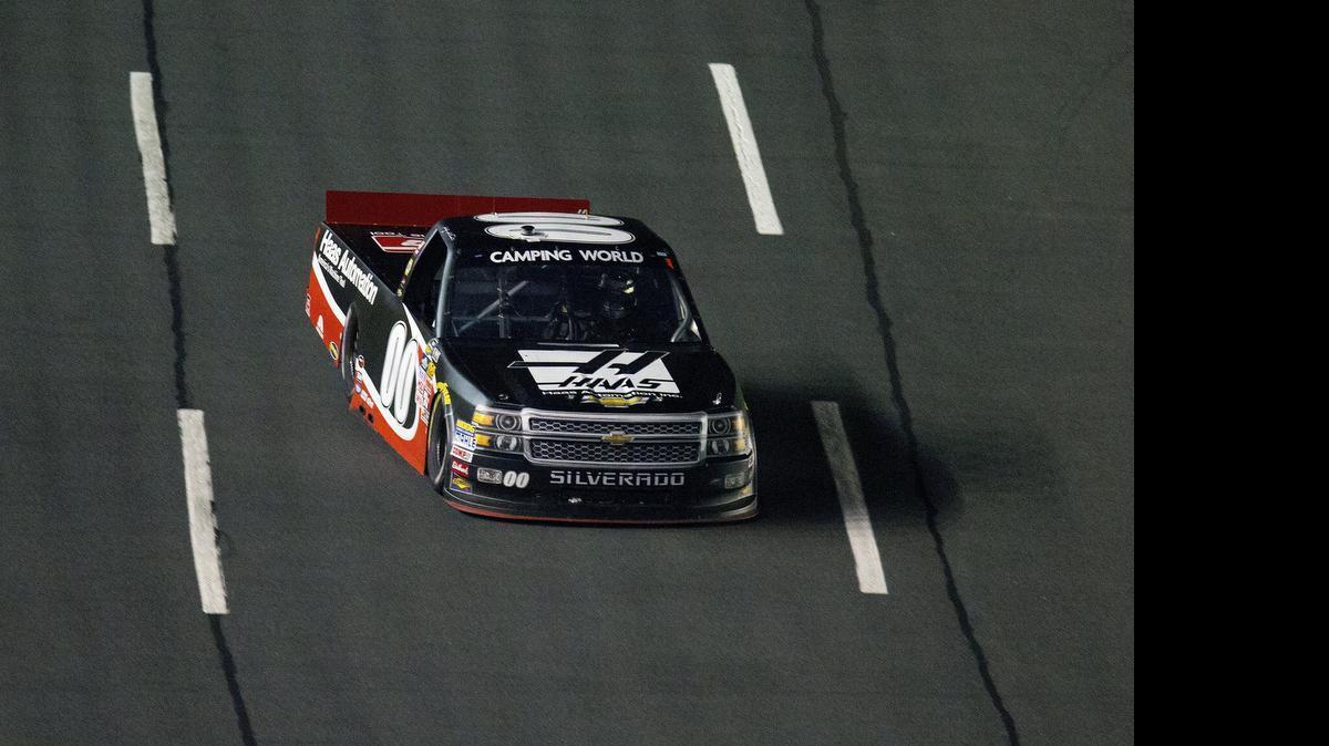 
Kasey Kahne (00) races down the front stretch during the NASCAR Trucks series auto race at Charlotte Motor Speedway in Concord, N.C., on Friday, May 15, 2015. 
