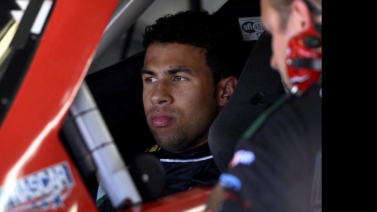 
NASCAR Xfinity Series driver Bubba Wallace waits in his car for the start of practice on Thursday at Charlotte Motor Speedway in Concord.
