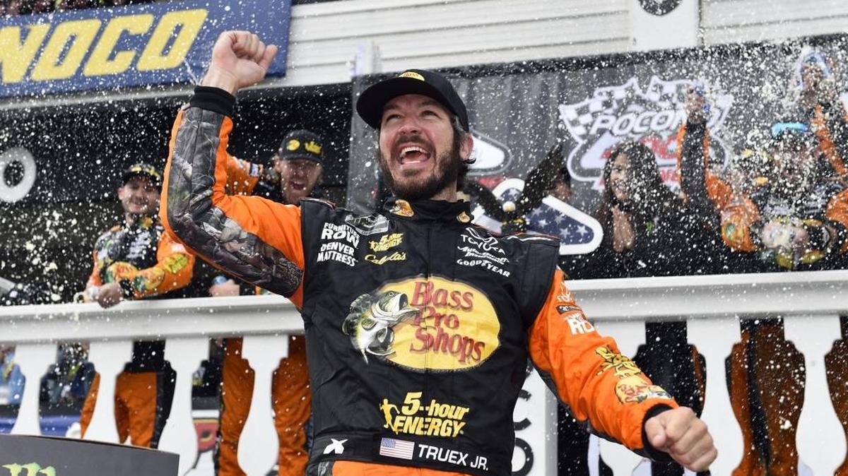 Holding off Kyle Busch and Kevin Harvick, Martin Truex Jr. took his second NASCAR Cup Series win of the 2018 season in Sunday’s Pocono 400.