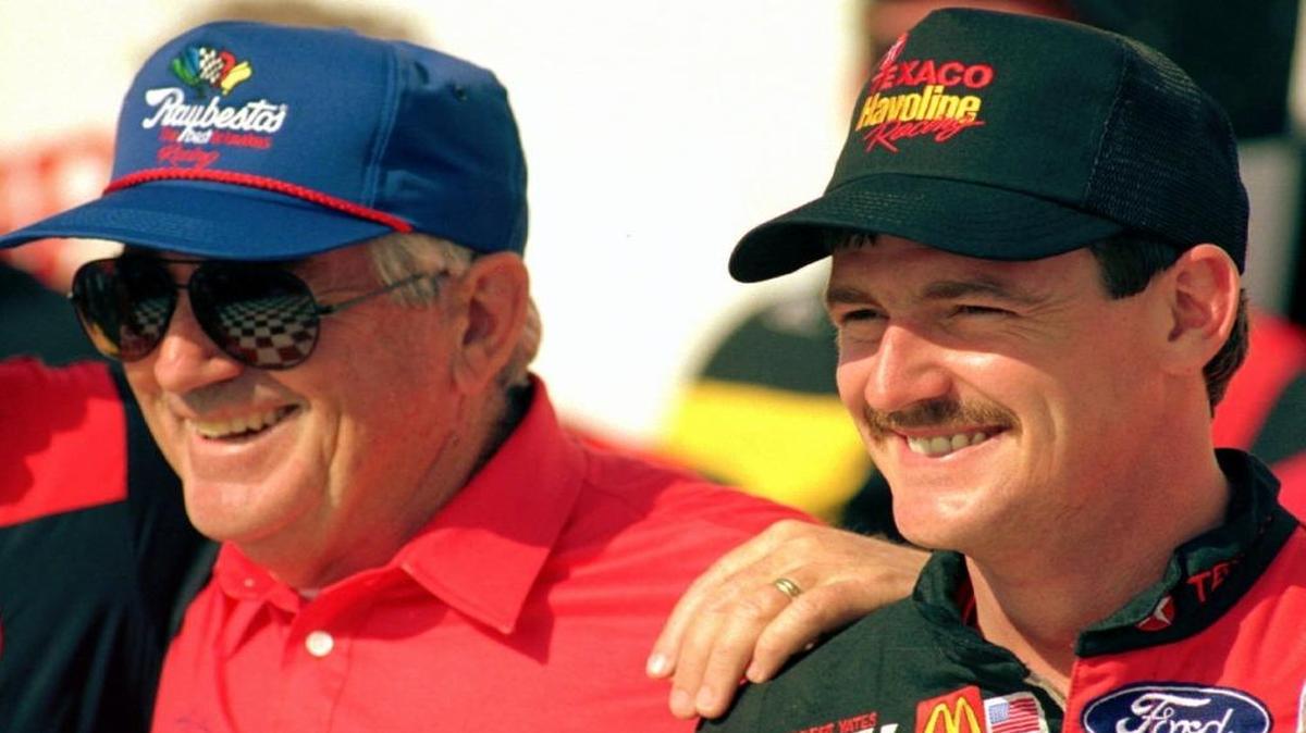 Davey Allison (right) stands in Victory Lane with his father, Bobby, after winning the Winston 500 at Talladega in 1992.