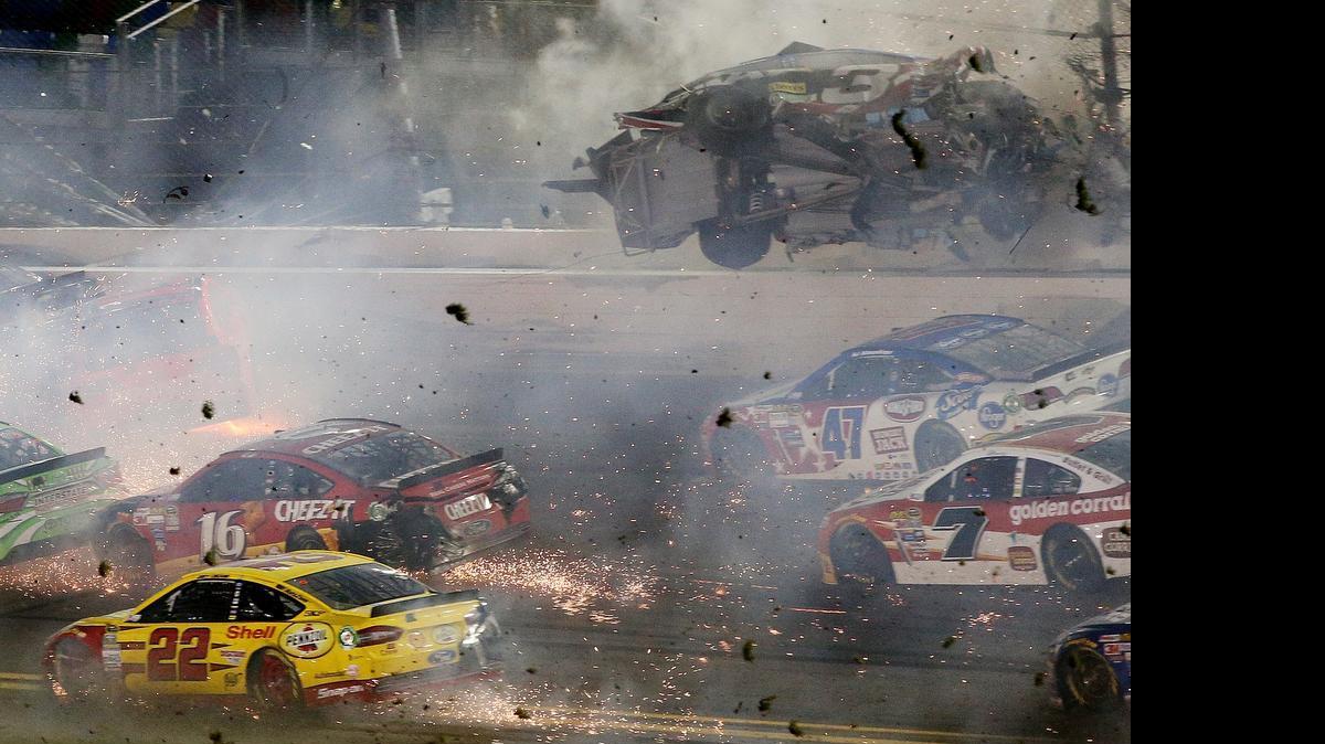 
Austin Dillon, driver of the No. 3 Bass Pro Shops Chevrolet, is involved in an incident following the checkered flag during the NASCAR Sprint Cup Series Coke Zero 400 Powered by Coca-Cola at Daytona International Speedway on Monday, July 6, 2015 in Daytona Beach, Fla.
