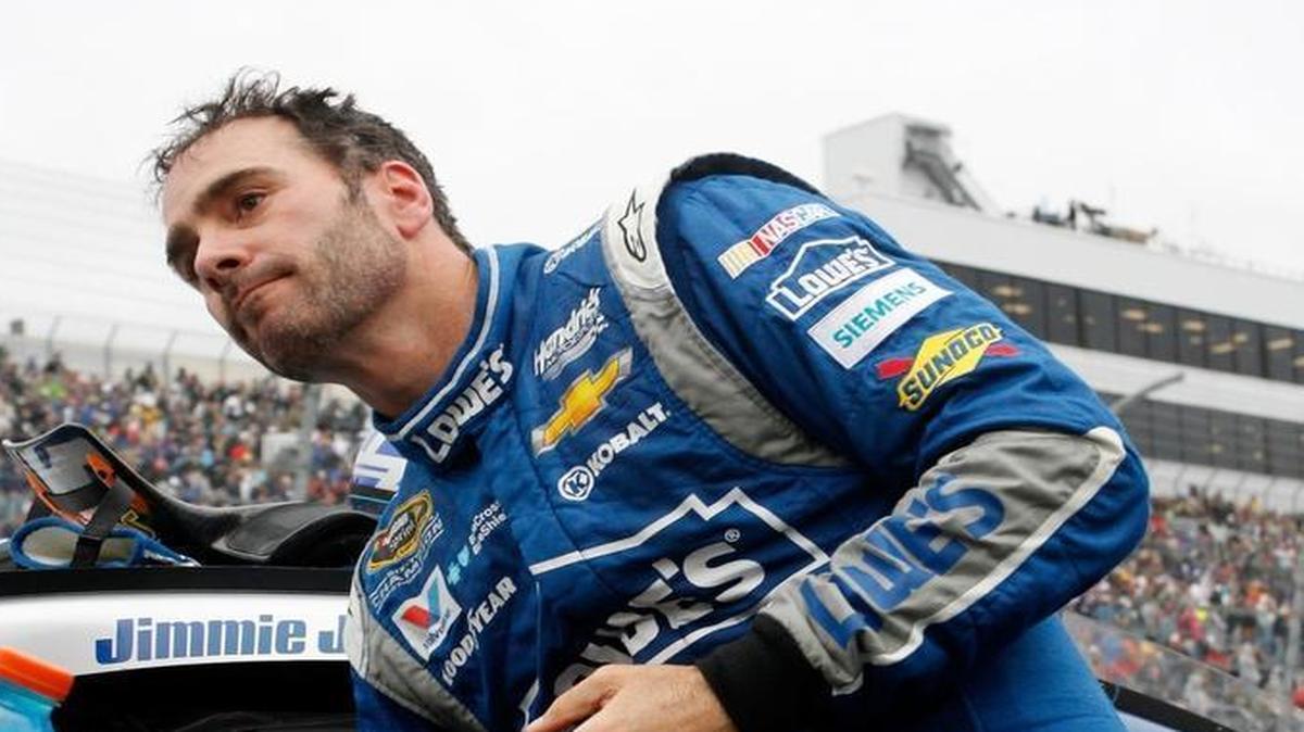 Jimmie Johnson climbs out of his car at Dover (Del.) International Speedway after a broken rear-axle seal caused him to finish 41st. He was eliminated from the Chase.