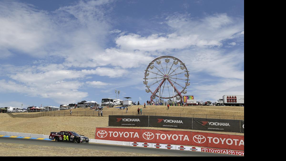 
Jeff Gordon races during qualifying for the NASCAR Sprint Cup Series auto race Saturday, June 27, 2015, in Sonoma, Calif.

