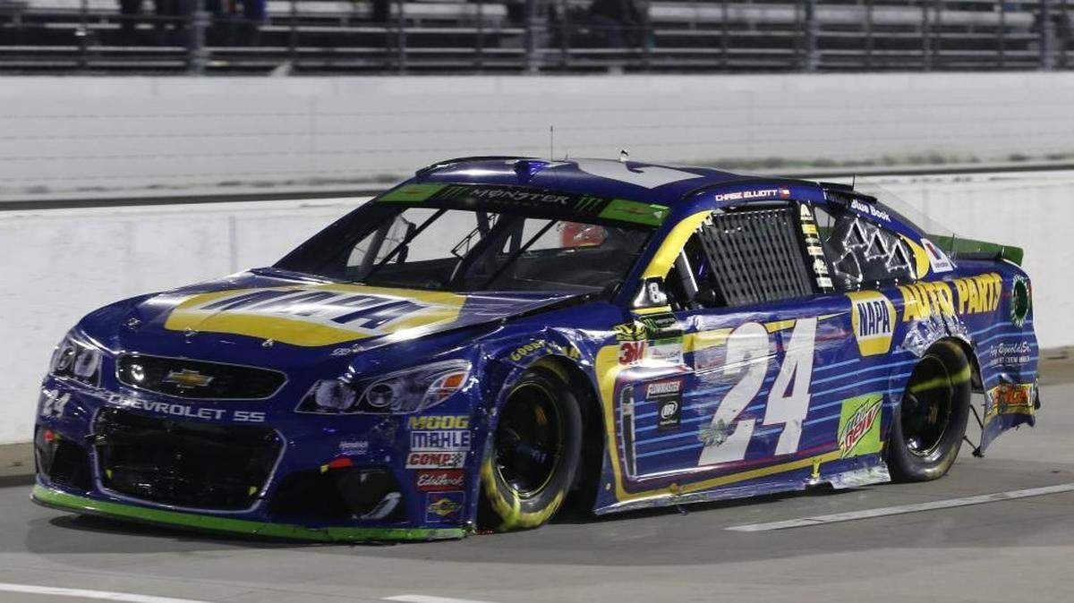 A hit from Denny Hamlin late in Sunday’s race sent Chase Elliott (24) straight into the wall, wrecking him and costing him both the win at Martinsville and a spot in the Cup Series championship race.