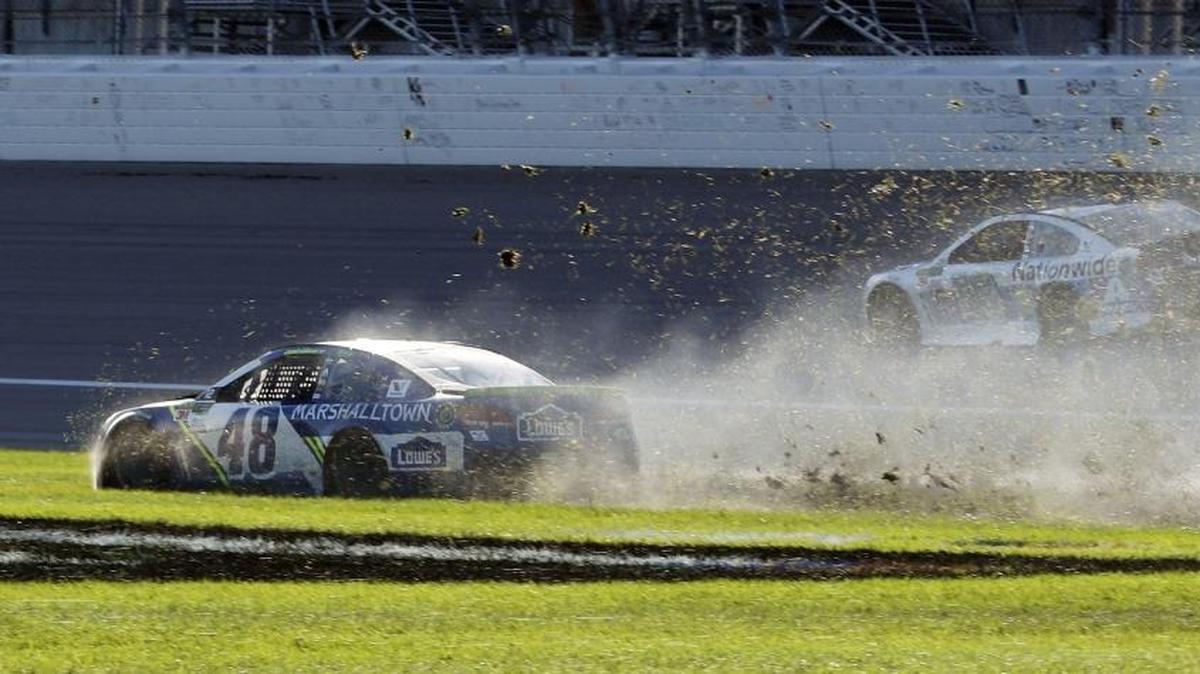 Jimmie Johnson (48) spins out in the infield during Sunday’s NASCAR Cup Series race at Kansas Speedway. Johnson survived last week’s playoffs elimination and will race this week at Martinsville, where he won last year.
