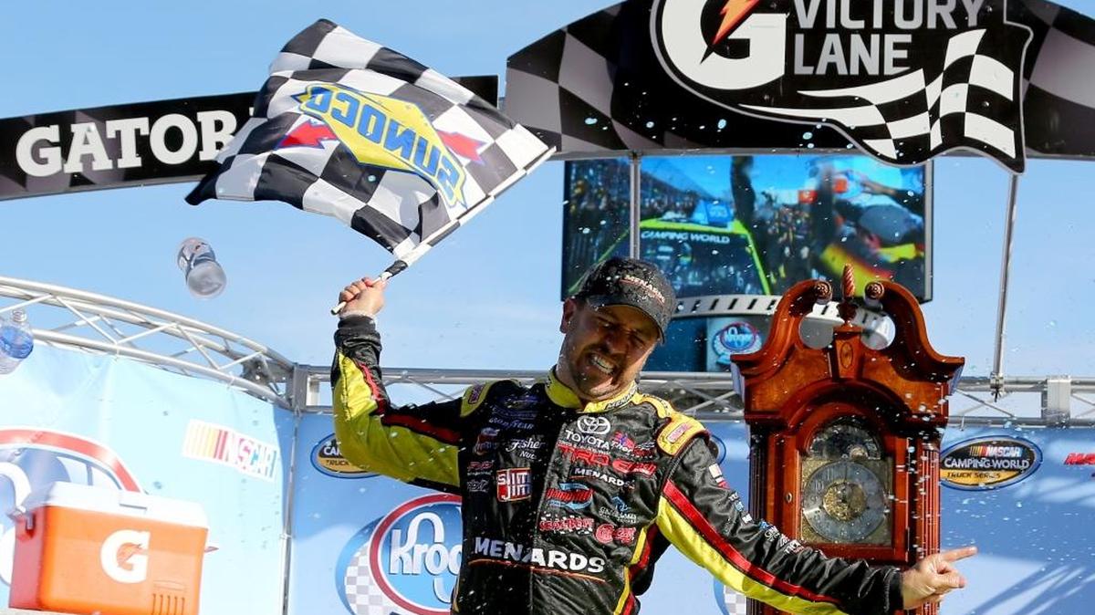 Matt Crafton celebrates Saturday’s win in the NASCAR Camping World Truck Series Kroger 200 at Martinsville Speedway.