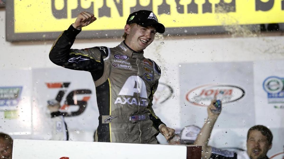 Charlotte’s William Byron celebrates in Victory Lane after winning Saturday’s NASCAR Xfinity Series auto race at Iowa Speedway in Newton, Iowa.