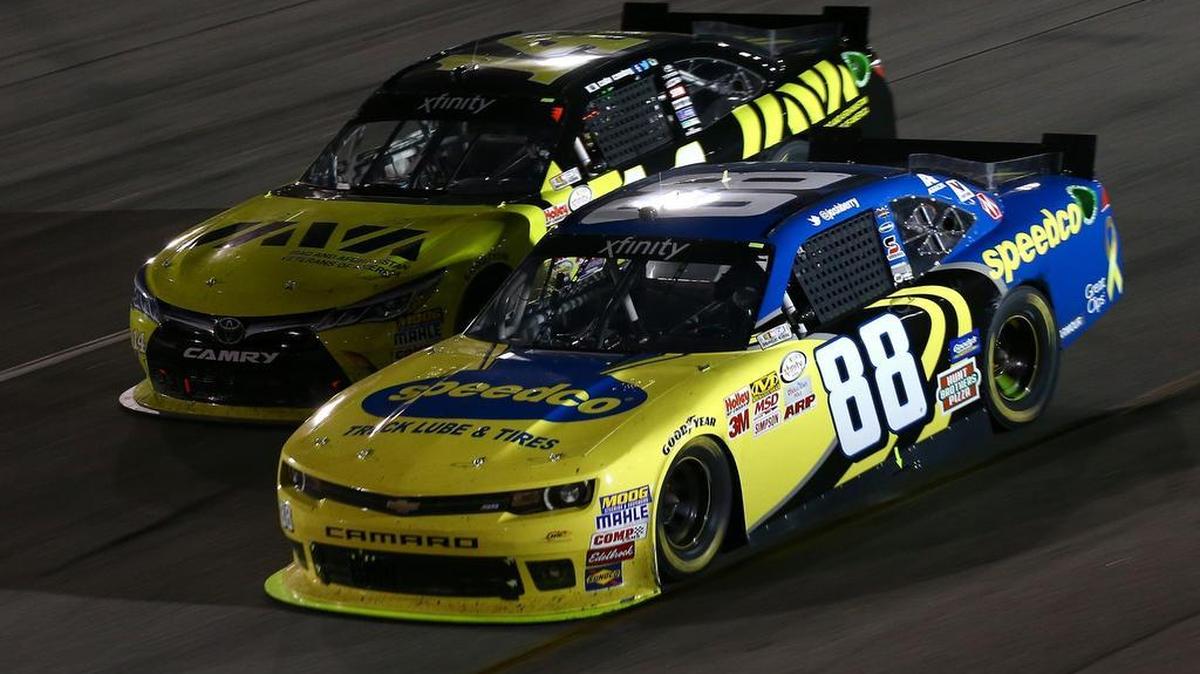 
 Josh Berry, driver of the No. 88 Speedco Chevrolet, races Cale Conley, driver of the No. 14 IAVA Toyota, during Friday’s NASCAR XFINITY Series Virginia529 College Savings 250 at Richmond International Raceway. 
