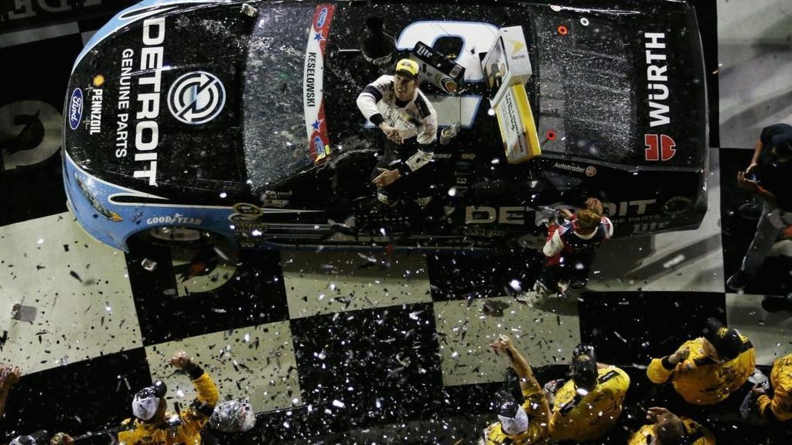 Brad Keselowski celebrates in Victory Lane after winning the NASCAR Sprint Cup Series Coke Zero 400 Powered By Coca-Cola at Daytona International Speedway on Saturday in Daytona Beach, Fla.