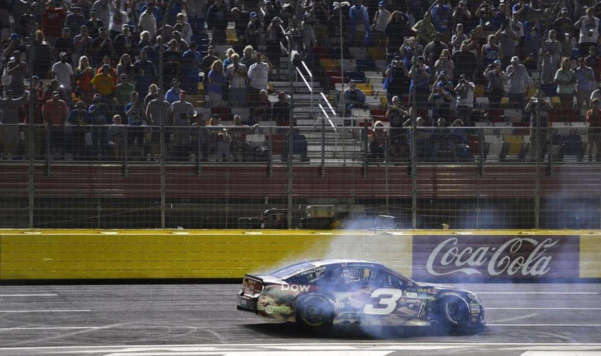 Austin Dillon celebrates after winning the Coca-Cola 600, a NASCAR Cup series race at Charlotte Motor Speedway on Sunday.