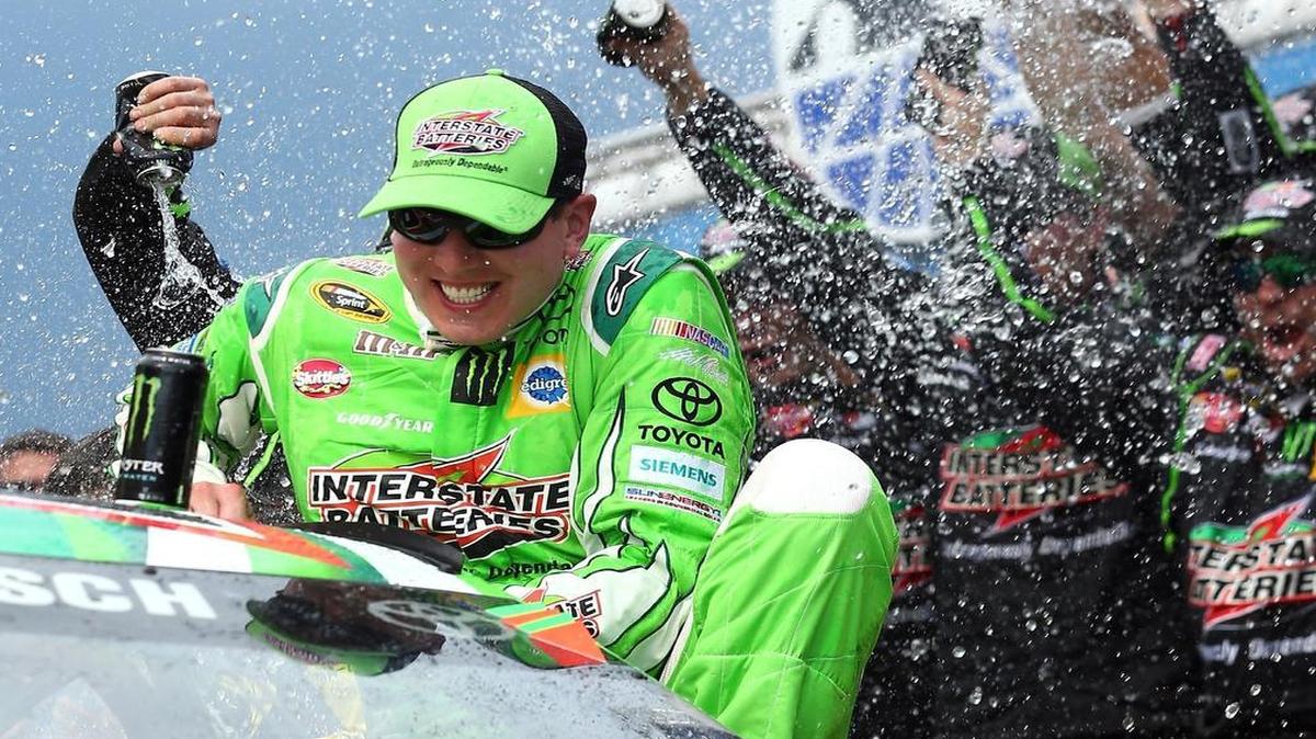 
Kyle Busch celebrates in Victory Lane after winning the NASCAR Sprint Cup Series 5-Hour ENERGY 301 at New Hampshire Motor Speedway on Sunday. The victory was his third in eight races since returning from leg and foot injuries suffered at Daytona. 
