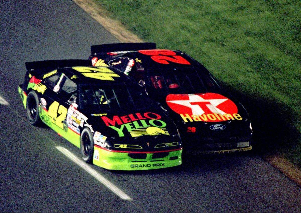 Kyle Petty (left) and Davey Allison (right) battled for the lead in the 1992 Winston, the first NASCAR race held under the lights at Charlotte Motor Speedway.