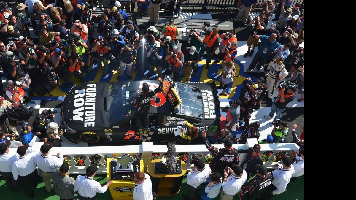 
Martin Truex Jr. ended a nearly two-year winless streak by holding off Kevin Harvick to win Sunday’s Axalta 400 at Pocono Raceway and all-but locking in a berth in this season’s championship Chase.


