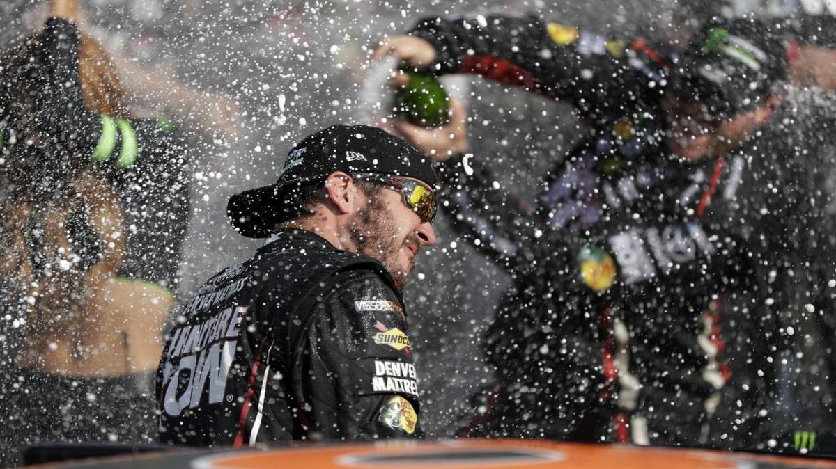 You’ll need your own champagne, but NASCAR plans to tive you a true “insider” look from a playoff competitor’s car for the 10 postseason Cup Series races, via a live video stream on Twitter. Above, Martin Truex Jr., currently atop the points standings, celebrates after winning the Cup Series race Aug. 6 in Watkins Glen, N.Y.