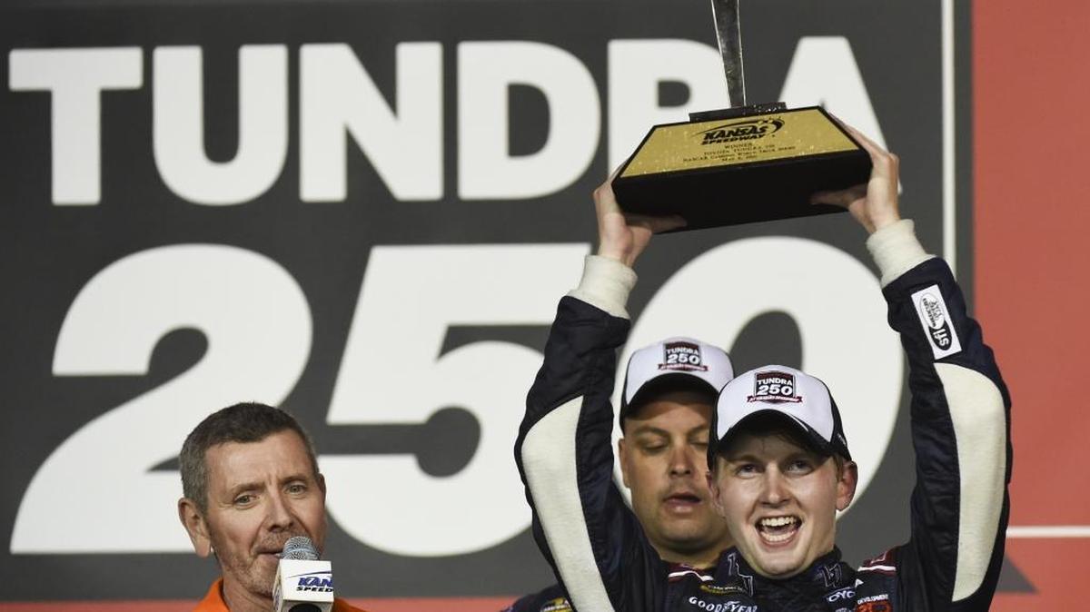 William Byron (9) celebrates after winning his first NASCAR Truck series race last Friday at Kansas Speedway.