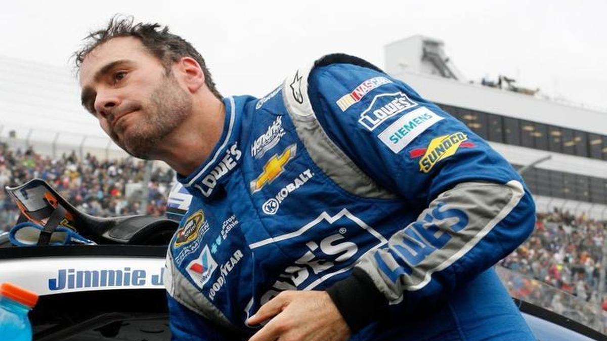 Jimmie Johnson climbs out of his car after finishing last year’s fall race at Dover. A broken rear axle seal doomed Johnson’s hopes of advancing in the Chase.