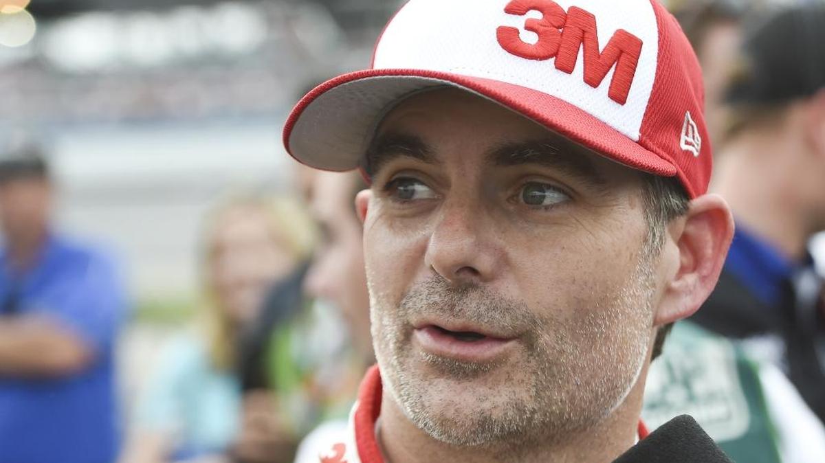 Sprint Cup Series driver Jeff Gordon (24) speaks to a reporter after qualifying for the NASCAR Sprint Cup Series auto race at Talladega Superspeedway Saturday, Oct. 24, 2015, in Talladega, Ala.