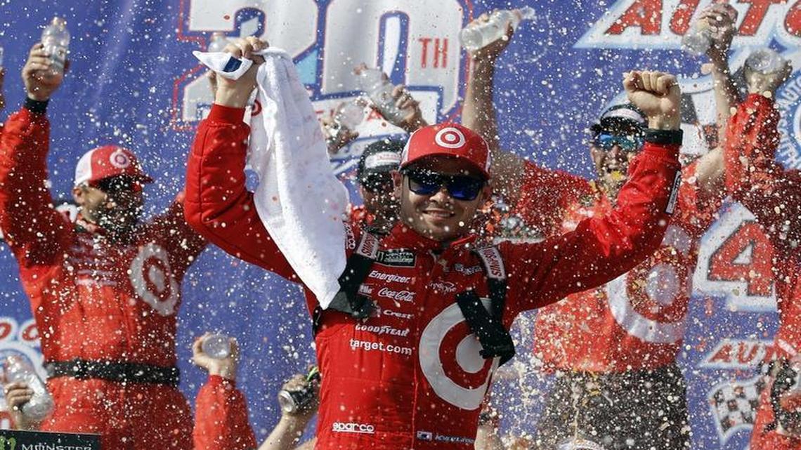 Kyle Larson celebrates after winning Sunday’s NASCAR Cup Series auto race at Auto Club Speedway in Fontana, Calif.