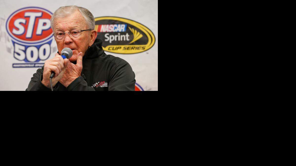
NASCAR team owner Joe Gibbs, addresses the media about the condition of his son J.D. Gibbs in the media center prior to the start of the NASCAR Sprint Cup race at the Martinsville Speedway in Martinsville, Va., Sunday, March 29, 2015. Joe Gibbs Racing President J.D. Gibbs is undergoing treatment for "symptoms impacting areas of brain function," which likely stem from a head injury suffered earlier in life. 
