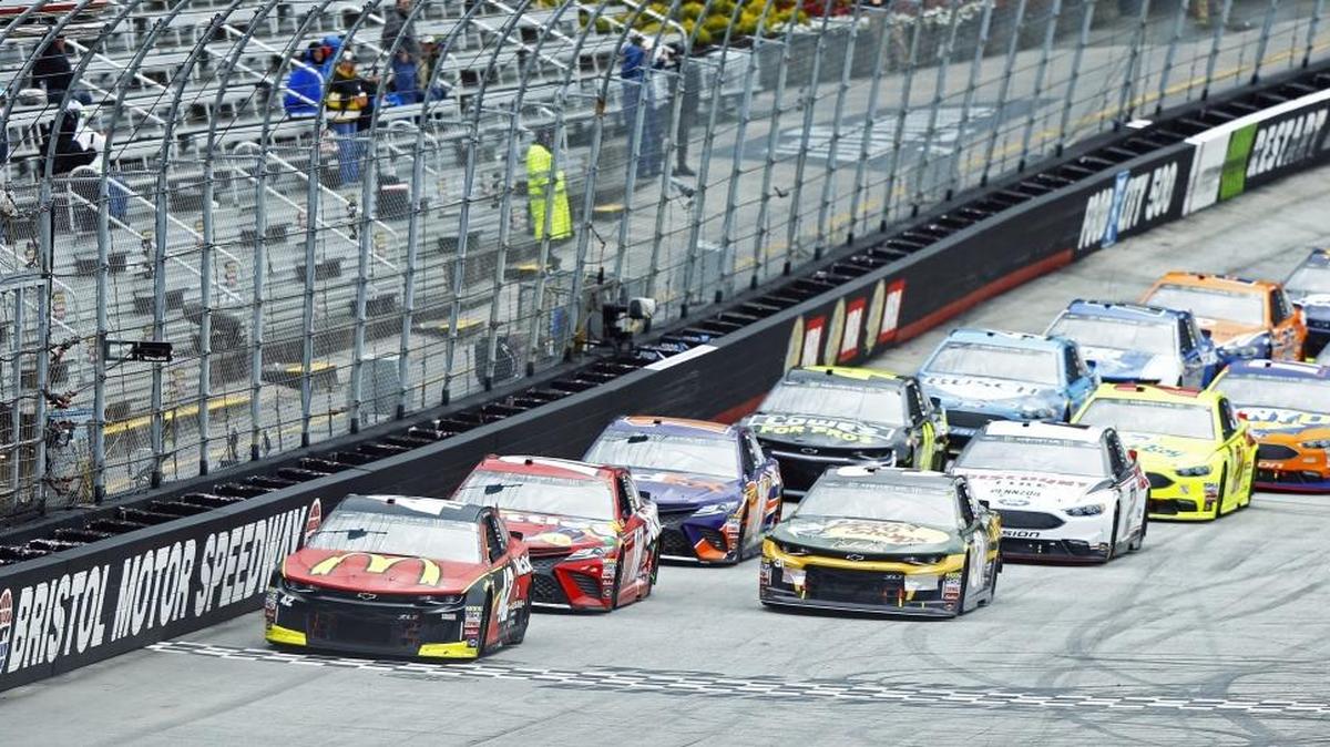 Kyle Larson (42) leads the field to the start/finish line Monday for the continuation of NASCAR’s Cup Series race at Bristol, Tenn., after it was called Sunday due to inclement weather.