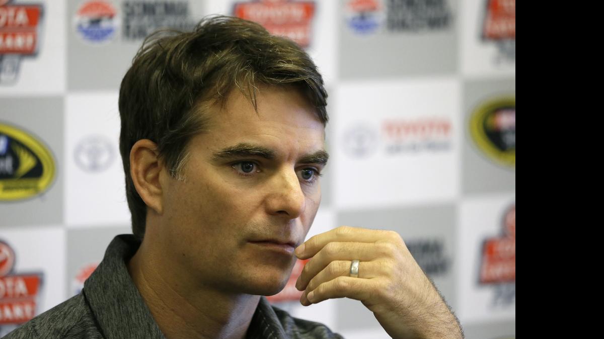 
Jeff Gordon answers questions during a news conference before practice for the NASCAR Sprint Cup Series auto race Friday, June 26, 2015, in Sonoma, Calif. 
