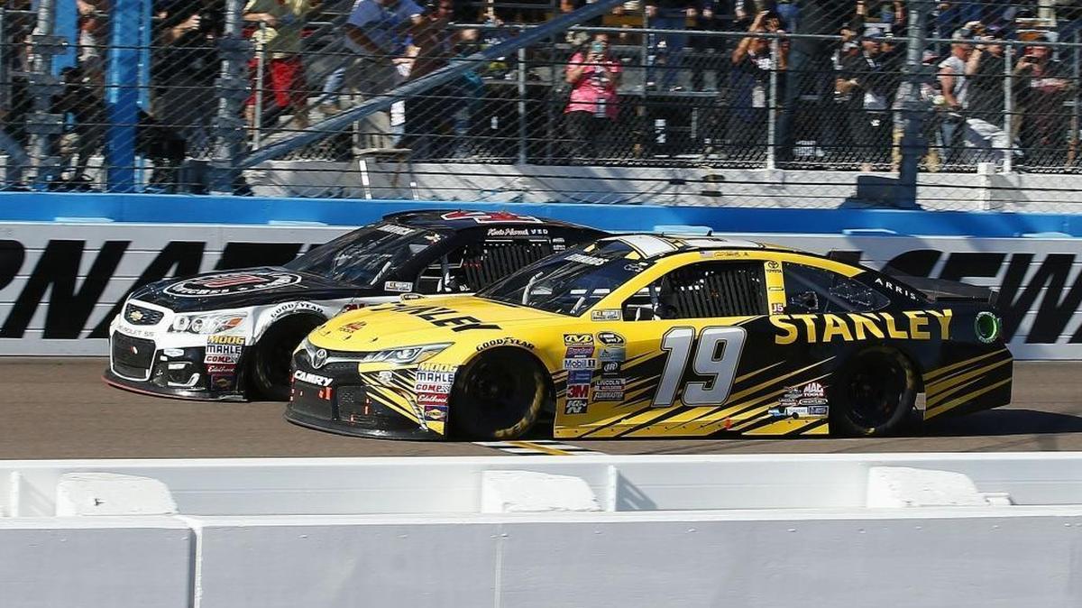 NASCAR’s new low downforce aerodynamic package played a part in Kevin Harvick’s narrow victory over Carl Edwards (19) at Phoenix.