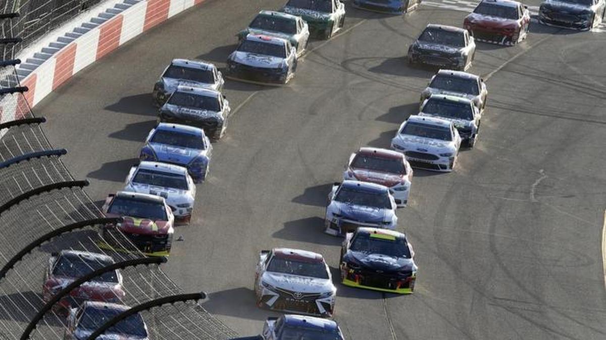 Cars line up at the start of NASCAR Cup series race at Richmond Raceway in Richmond, Va., in April. On Saturday at the track, 26-year-old Israeli driver Alon Day will make his 2018 Cup series debut driving the BK Racing No. 23 Best Bully Sticks Toyota Camry in the Federated Auto Parts 400.