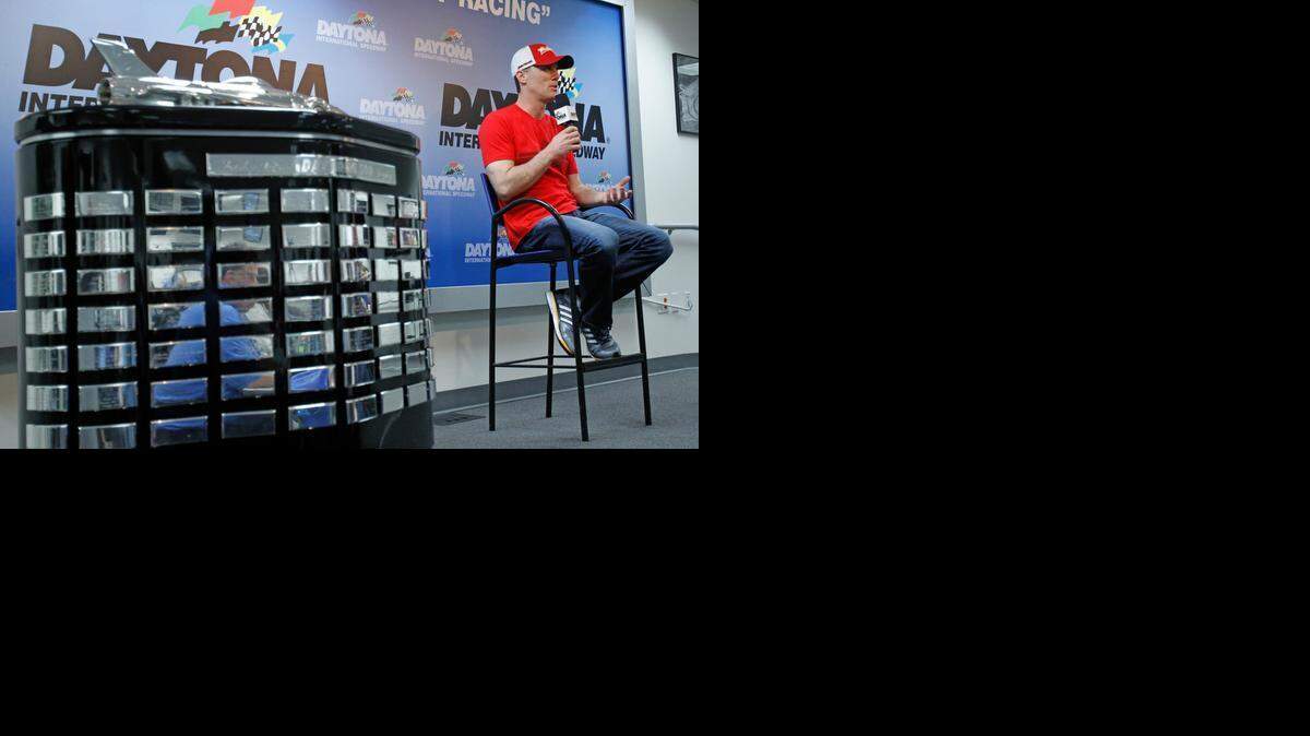 
Defending Sprint Cup champion Kevin Harvick speaks to the media before the Daytona 500 NASCAR Sprint Cup series auto race at Daytona International Speedway, Sunday, Feb. 22, 2015, in Daytona Beach, Fla. 
