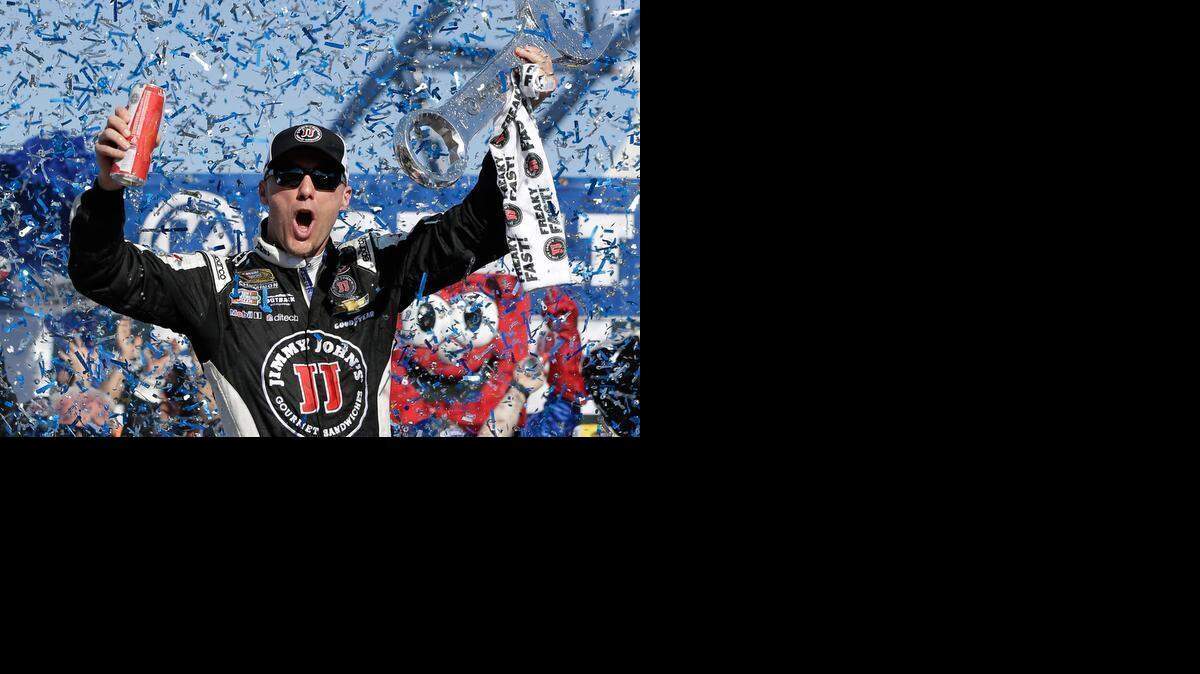 
Kevin Harvick celebrates in Victory Lane after winning a NASCAR Sprint Cup series auto race Sunday, March 8, 2015, in Las Vegas. 

