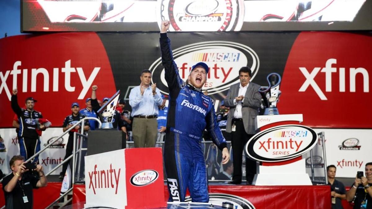 Chris Buescher celebrates winning the series championship in Victory Lane after Saturday’s NASCAR XFINITY Series Ford EcoBoost 300 at Homestead-Miami Speedway.