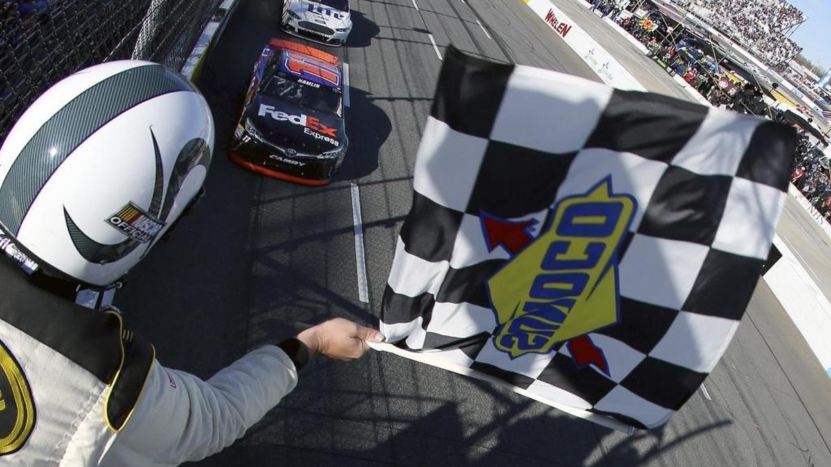 Denny Hamlin edged Brad Keselowski to win the 2015 STP 500 at Martinsville Speedway, one of Hamlin’s five wins at the track.
