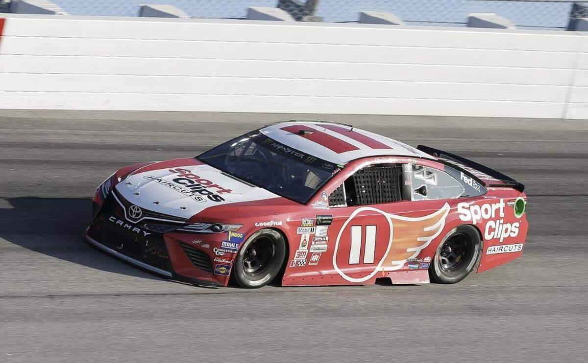 Denny Hamlin drives in Turn 1 during Sunday’s NASCAR Monster Cup auto race at Darlington Raceway.