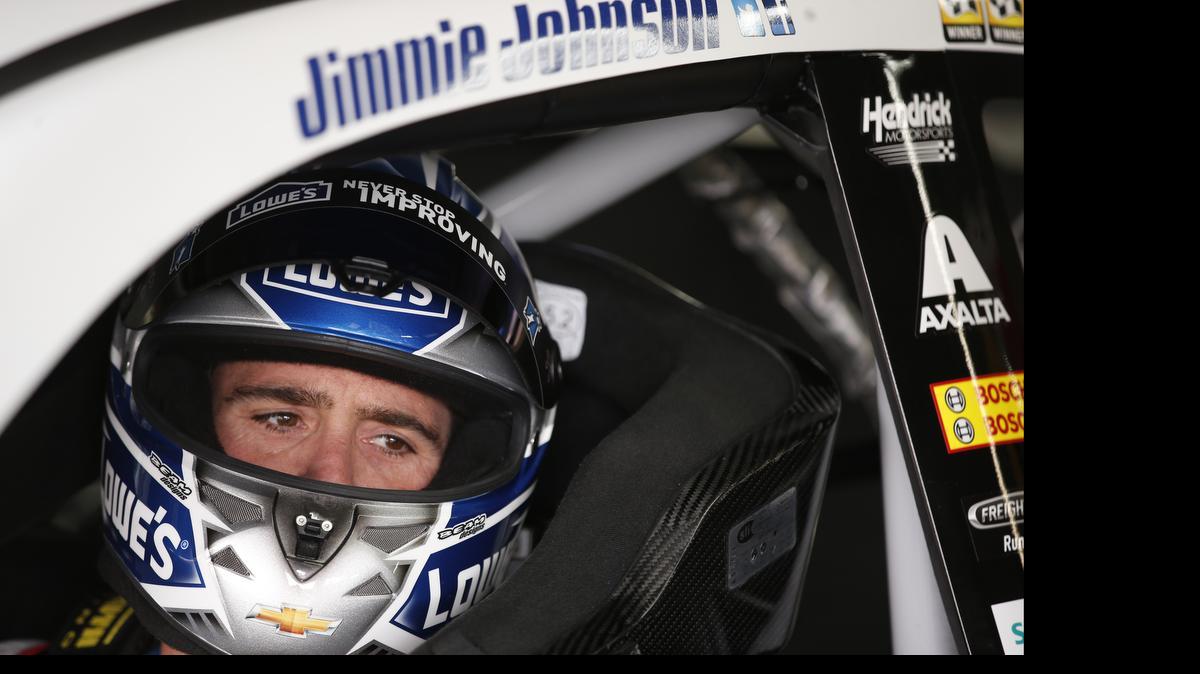
Jimmie Johnson sits in his car during practice for the NASCAR Sprint All-Star auto race in Concord, Friday, May 15, 2015.
