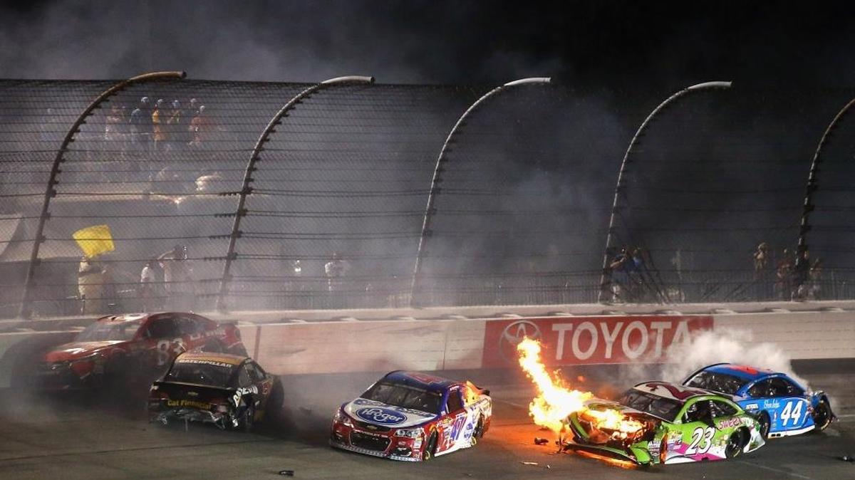 Ryan Newman (second from left) ends up in a multi-car wreck at Richmond International Raceway last Saturday, caused when he was hit by Tony Stewart.