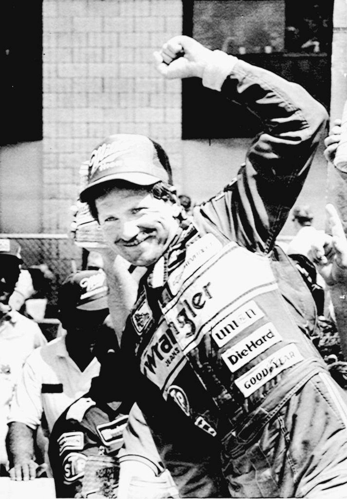 Dale Earnhardt celebrates after winning the 1987 NASCAR All-Star Race, which featured his famous “Pass in the Grass” with Bill Elliott.