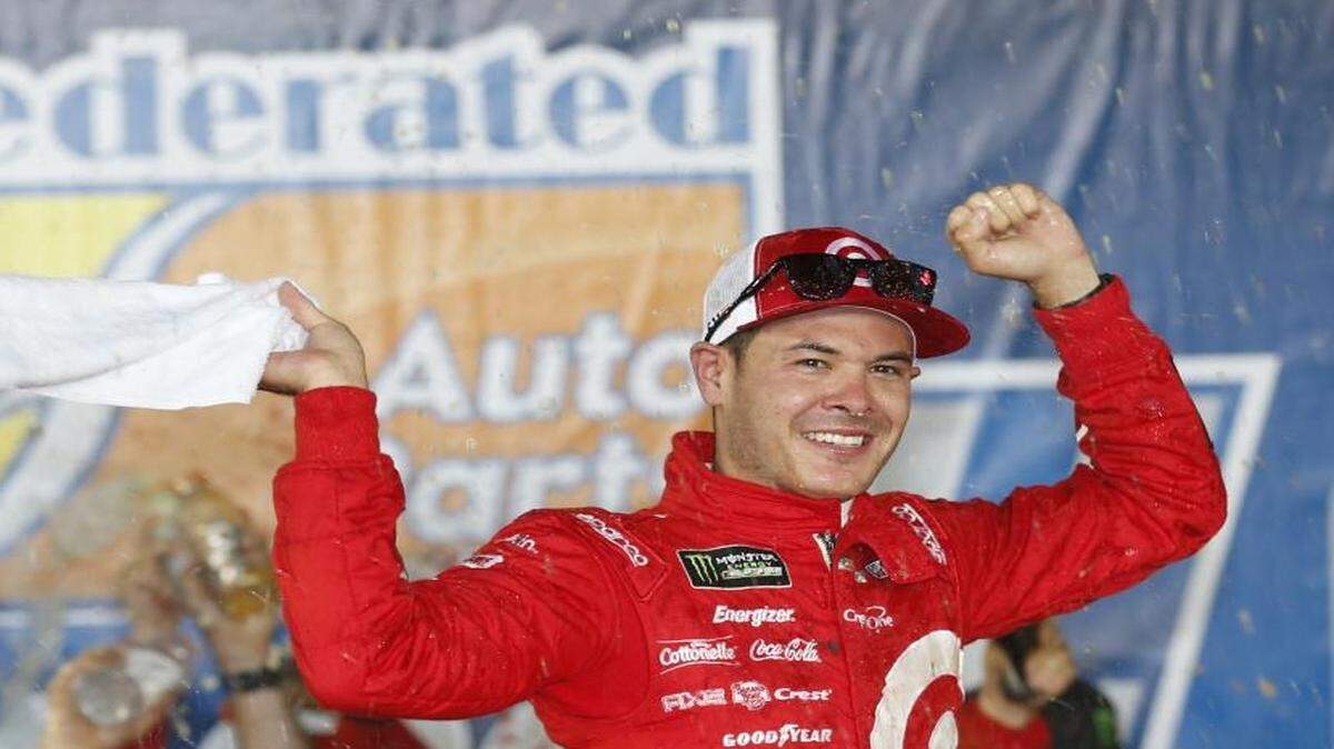Kyle Larson celebrates after winning Saturday’s NASCAR Cup Series race at Richmond Raceway in Richmond, Va.