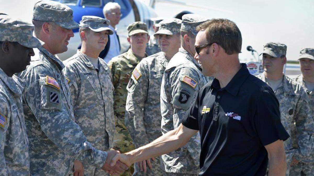 
Matt Kenseth, Chase for the NASCAR Sprint Cup Series challenger, greets soldiers at Wilson Air Center, Tuesday, September 15, 2015. The event was to thank fans for their support and preview the Oct. 10 Bank of America 500 Chase for the NASCAR Sprint Cup Contender Round race at Charlotte Motor Speedway. 

