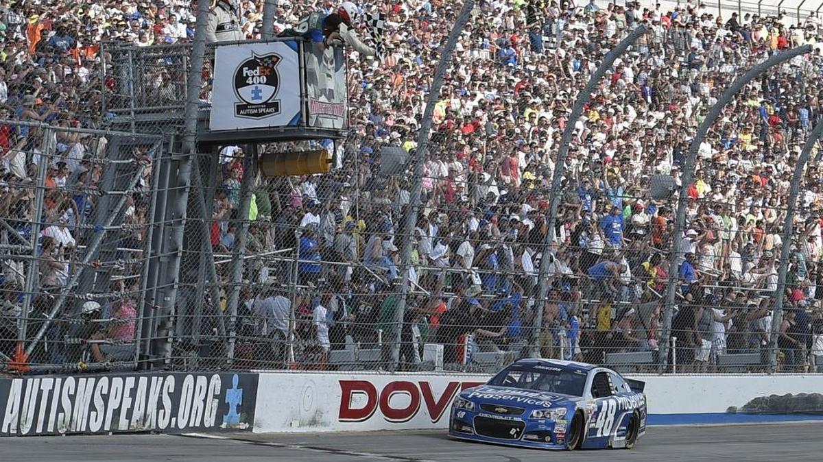 
Jimmie Johnson (48) takes the checkered flag to win the NASCAR Sprint Cup series auto race in May at Dover International Speedway in Dover, Del. Sunday’s AAA 400 at Dover is the final race in the Chase’s opening round; the bottom four in the 16-driver field will be eliminated.
