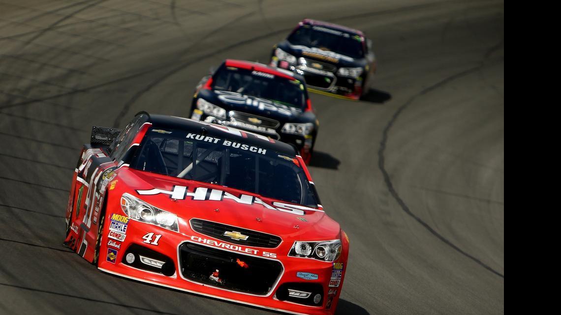 
Kurt Busch leads Kasey Kahne and Dale Earnhardt Jr.during the NASCAR Sprint Cup Series Quicken Loans 400 at Michigan International Speedway on Sunday, June 14, 2015 in Brooklyn, Mich.
