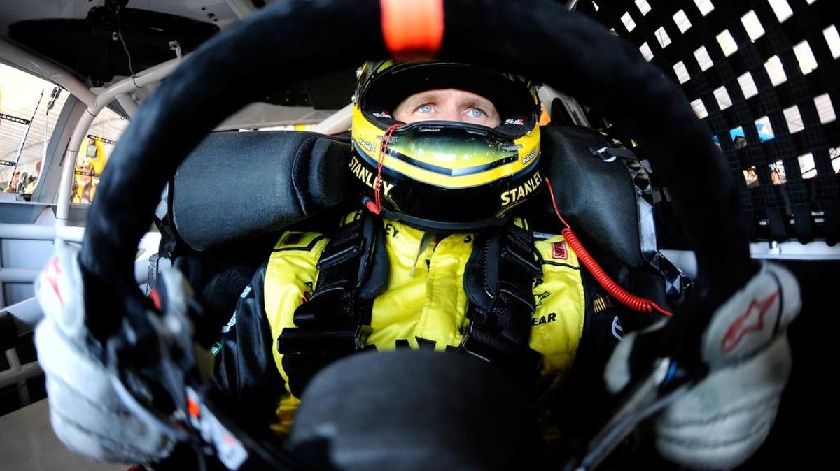 
Carl Edwards sits in his car in the garage area during practice for the NASCAR Sprint Cup Series Windows 10 400 at Pocono Raceway on Saturday, Aug. 1, 2015 in Long Pond, Pa.
